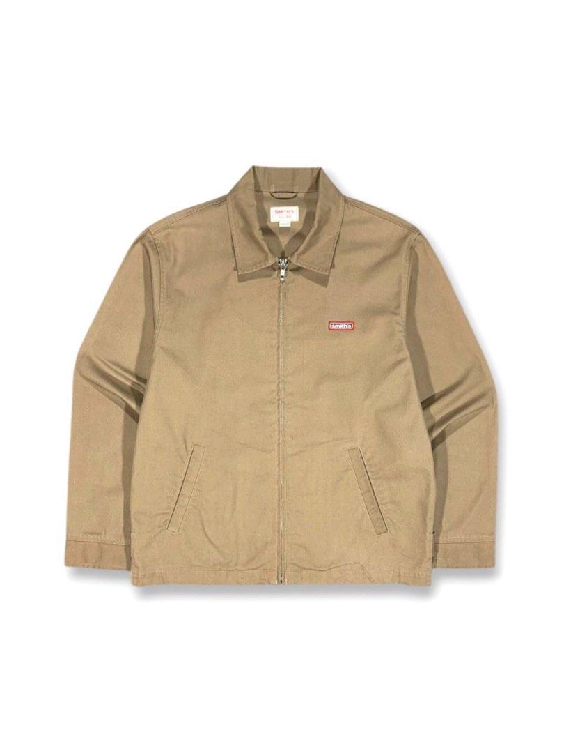 Smith's American (Category: Coats, Jackets and Outerwear) located in Zamboanga. Submitted by zhifay (Listing ID 1464102431, Image 1). Description: Smith's American Since 1906 Zipper Workwear Jacket Features beige/khaki cotton twill construction, full front zip closure, dual side pockets, adjustable button cuffs, and the signature red logo chest patch. Measurement (inches): Tag Size: Large Pit to Pit: 22.5" Length: 27" Condition: 9.5/10 Excellent 