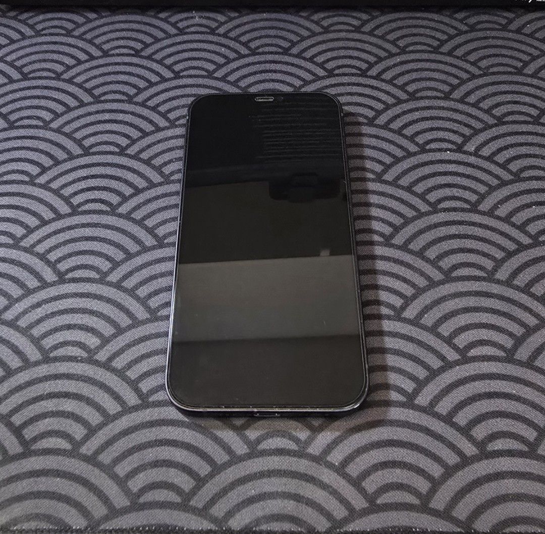 Smooth Iphone 12 - NEGO |No Issues (Category: iPhone 12 Series) located in Angeles City. Submitted by bananasmoothie123 (Listing ID 1463974770, Image 1). Description: - iPhone 12 - No issues - Color: Blue - Condition: Smooth, no issues - Sleek and modern design - Charger included - 3 cases included - 2 NEW tempered glass included - Unli Test - 76% BH -Small chip sa baba Meet up - Angeles IF Delivery, sf to be shouldered by buyer .