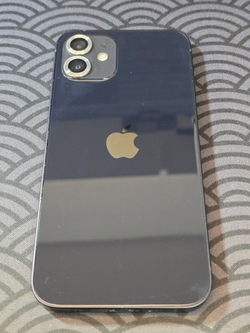 Smooth Iphone 12 - NEGO |No Issues (Category: iPhone 12 Series) located in Angeles City. Submitted by bananasmoothie123 (Listing ID 1463974770, Image 2). Description: - iPhone 12 - No issues - Color: Blue - Condition: Smooth, no issues - Sleek and modern design - Charger included - 3 cases included - 2 NEW tempered glass included - Unli Test - 76% BH -Small chip sa baba Meet up - Angeles IF Delivery, sf to be shouldered by buyer .