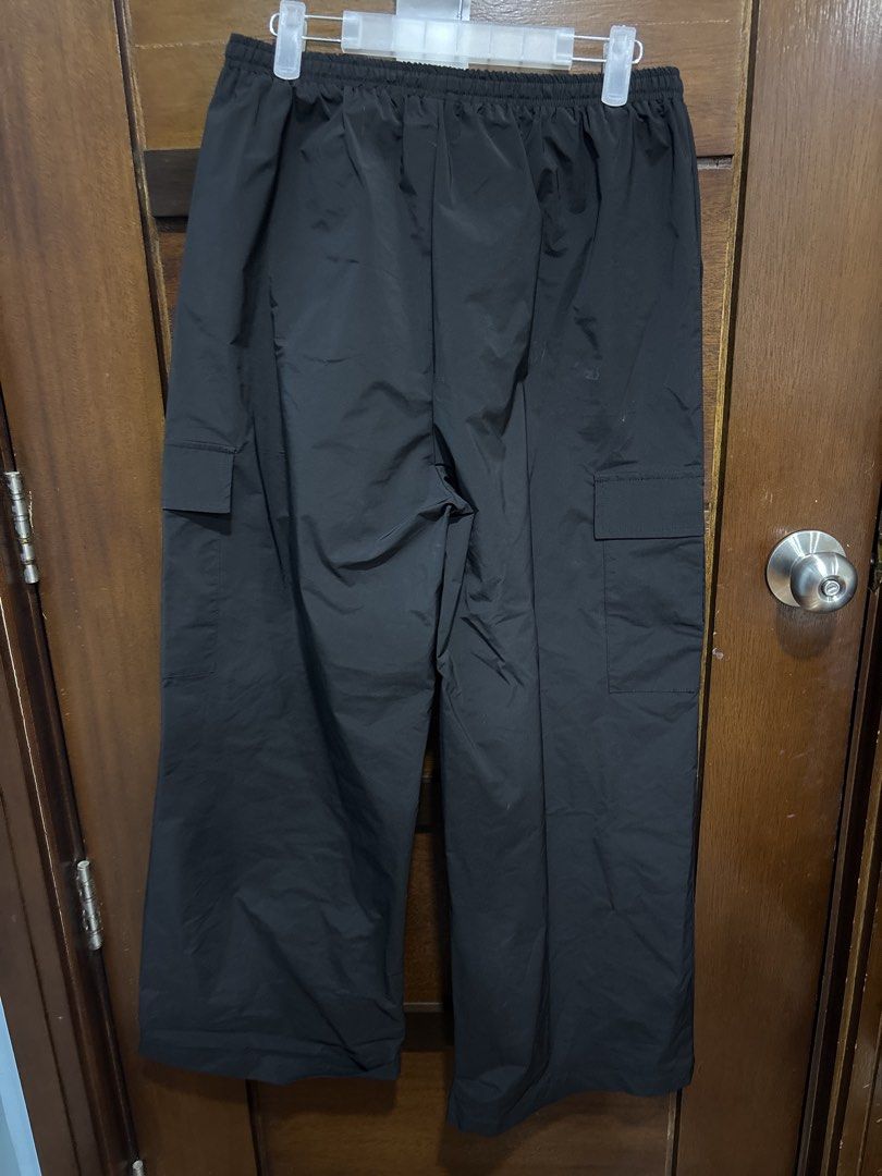 SODA Cargo Pants Black Size M (Category: Jeans) located in Mandaluyong City. Submitted by clothescarousel (Listing ID 1464050856, Image 3). Description: - Brand: SODA - Color: Black - Style: Cargo Pants - Features: Elastic waistband with drawstring, two side pockets, two cargo pockets on legs - Fit: Relaxed - Occasion: Casual wear.