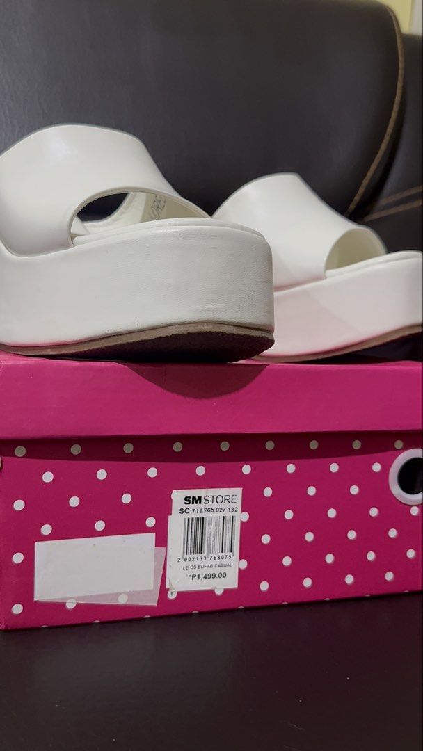 Sofab White Platform Wedge Sandals (Category: Wedges) located in Caloocan City. Submitted by anicaaaaaa (Listing ID 1463941842, Image 1). Description: Used but in good condition ♡ Authentic / Original ♡ No major flaws ♡ With box (slightly damaged) ♡ No paper bag ♡ Size 38 ♡ Original Price: ₱1,499 ♡ Selling Price: ₱800 📦 Shipping fee shouldered by buyer 🚚 Available couriers: J&T, LBC, Lalamove.