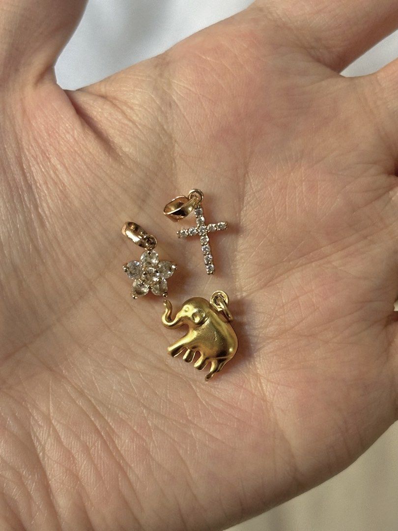 Solasta Gold Charm necklace (Category: Necklaces) located in Manila. Submitted by brownbutterlatte (Listing ID 1463962151, Image 3). Description: Length is 20” - 5 charms included with solasta pouch Used once in singapore! Note: missing carabiner. RFS: not my style anymore. .