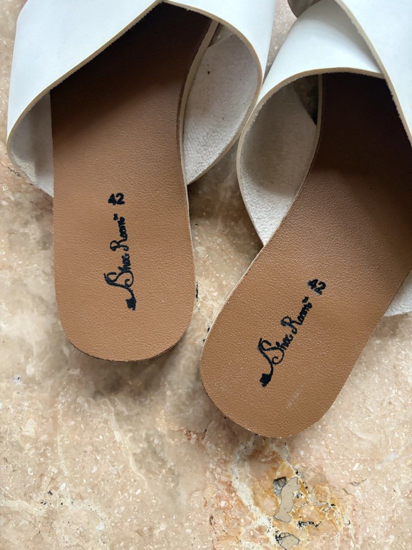 Sole Rome White Crisscross Slides (Category: Slippers and slides) located in Quezon City. Submitted by tidyup.lara (Listing ID 1464134992, Image 2). Description: Sold as is Size 42 Condition 8/10: used but in good condition.