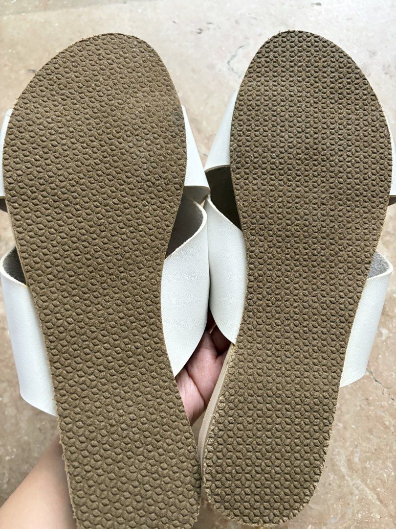 Sole Rome White Crisscross Slides (Category: Slippers and slides) located in Quezon City. Submitted by tidyup.lara (Listing ID 1464134992, Image 3). Description: Sold as is Size 42 Condition 8/10: used but in good condition.