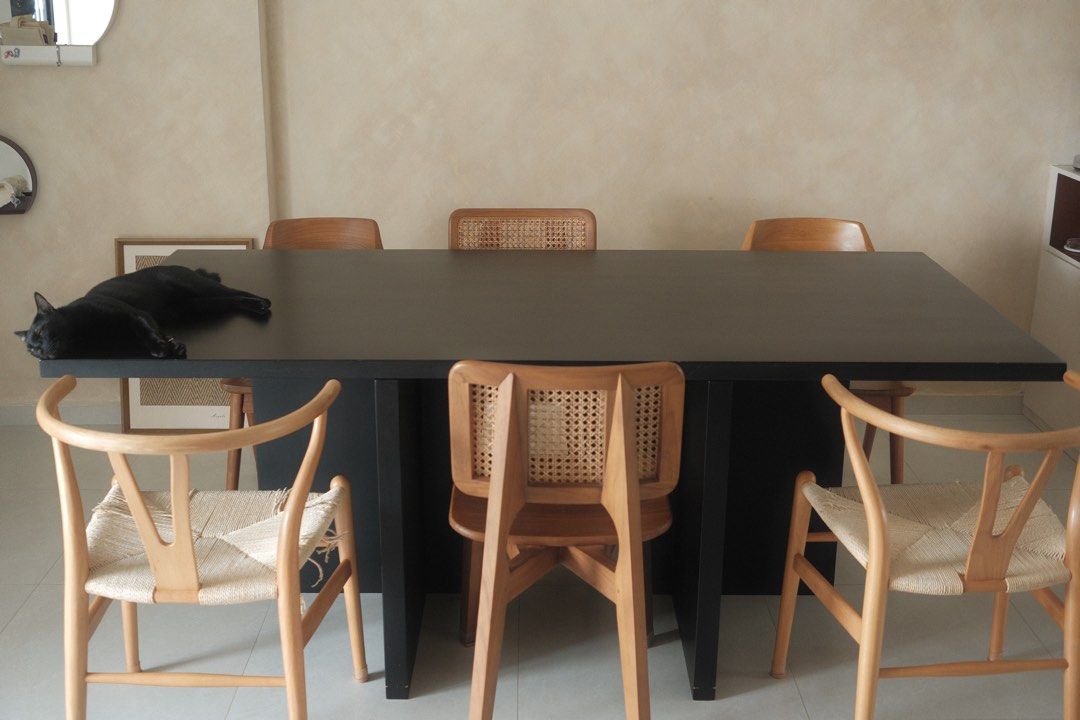 Solid wood dining table (Category: Tables & Sets) located in Singapore. Submitted by swell0 (Listing ID 1463976333, Image 1). Description: We custom made this dining table from @/gamarfurniture in 2022. it measures 2m x 1m, and can easily sit 6 as seen in the pictures. elbows do not touch, and no awkward leg brushing. if you add a bench/chairs at the end, you can sit up to 10. it’s perfect for people who like to host or use their dining table as 
