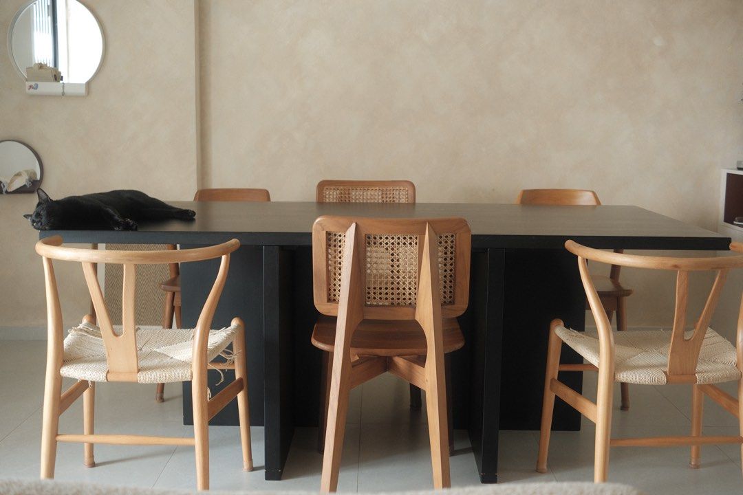 Solid wood dining table (Category: Tables & Sets) located in Singapore. Submitted by swell0 (Listing ID 1463976333, Image 2). Description: We custom made this dining table from @/gamarfurniture in 2022. it measures 2m x 1m, and can easily sit 6 as seen in the pictures. elbows do not touch, and no awkward leg brushing. if you add a bench/chairs at the end, you can sit up to 10. it’s perfect for people who like to host or use their dining table as 
