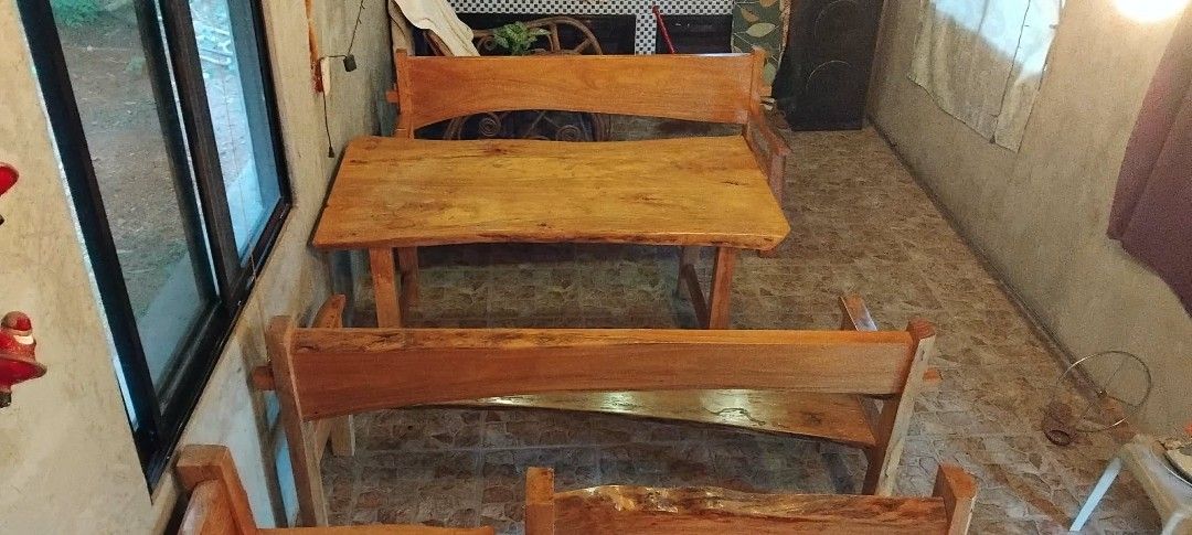 Solid Wood Live Edge Dining Table and Benches Set (Category: Tables & Sets) located in Manila. Submitted by lavillajoh99589 (Listing ID 1463942944, Image 1). Description: - Beautiful solid wood dining set - Includes live edge table and two matching benches - Features natural wood grain and unique live edge design - Perfect for rustic or farmhouse aesthetics - Sturdy construction for durability - Ideal for dining areas or patios.