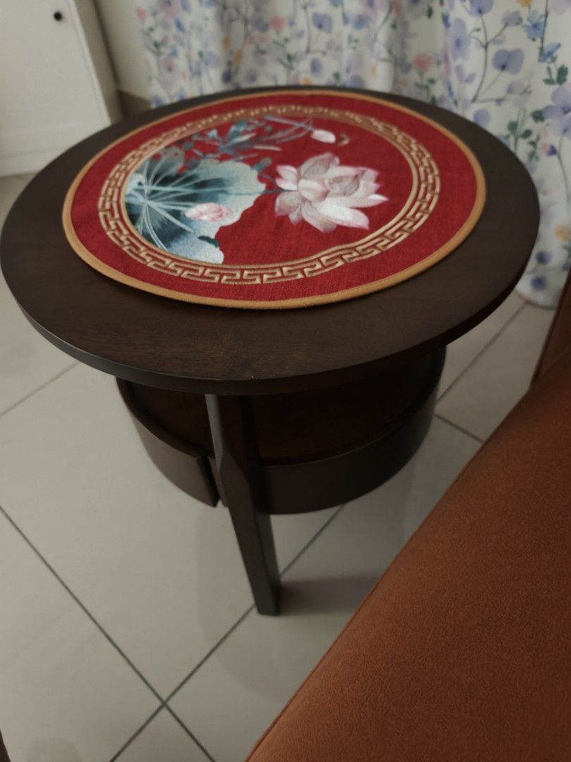 Solid Wood Round Side Table (Category: Tables & Sets) located in Nusajaya. Submitted by sanchella73 (Listing ID 1464112373, Image 3). Description: - Dark wood round side table - Features a lower shelf for extra storage - Perfect for living rooms or bedrooms.