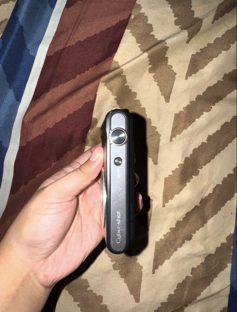 Sony Cyber-shot 5x Optical Zoom Digital Camera (Category: Cameras) located in Binan City. Submitted by lilyboogsh (Listing ID 1463967898, Image 3). Description: Sony Cyber-shot Digital Camera 📸 — ₱3,300 • 20.1 megapixels • 5x optical zoom • Compact & user-friendly design • Great for everyday photos & videos • Point & Shoot • Lightly used / good condition • Includes wrist strap + battery • ❌ No SD card • ❌ No charger 📍 Delivery: J&T or Lalamove 