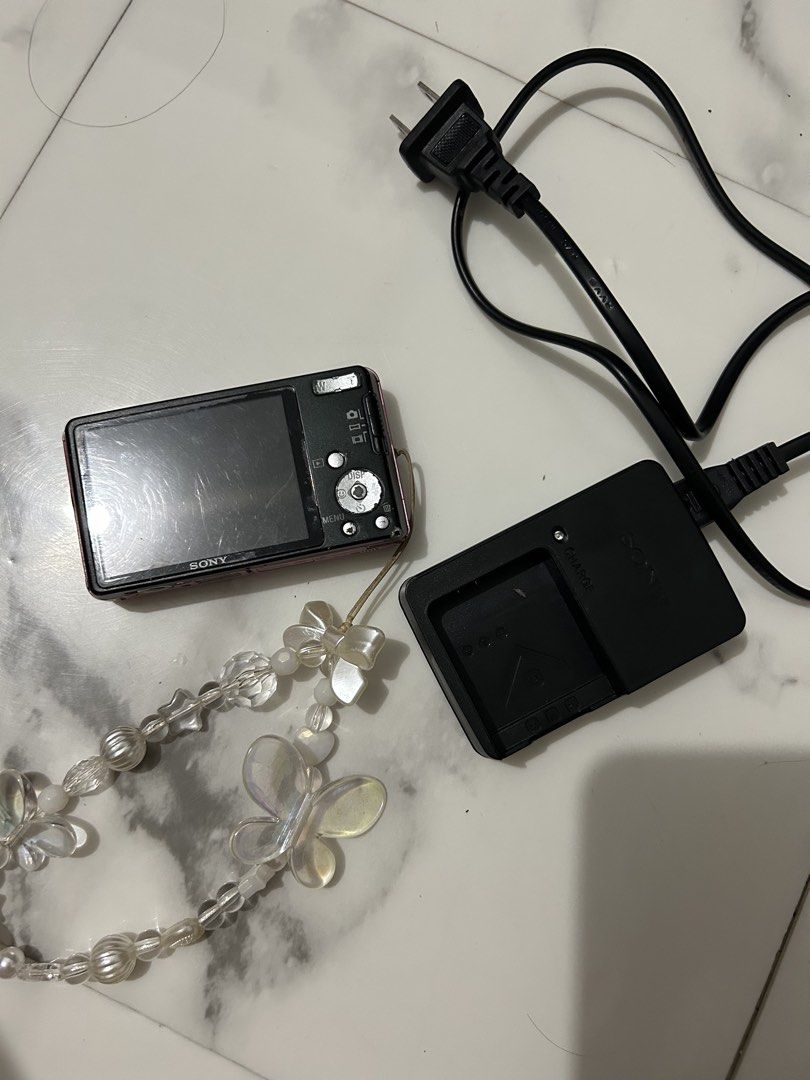 Sony cybershot pink (Category: Cameras) located in Manila. Submitted by digitelle (Listing ID 1463971237, Image 2). Description: - price negotiable - idk if it still works because the charger is not working anymore - body condition 6/10 the button is lose but repairable, and sometimes ghost touch - you just need new battery I think for it work but buy at your own risk .