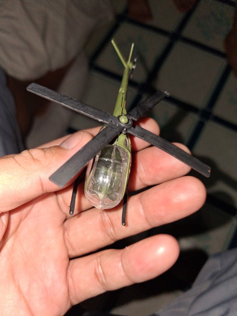 Special Forces Toy Helicopter with Camouflage (Category: Kids Toys) located in Manila. Submitted by marcas022798212 (Listing ID 1464051698, Image 2). Description: - Camouflage design toy helicopter - 'Special Forces' branding - Red star emblem on the side - Black blades - Palm-sized for easy handling - Ideal for collectors and kids who enjoy military-themed toys.