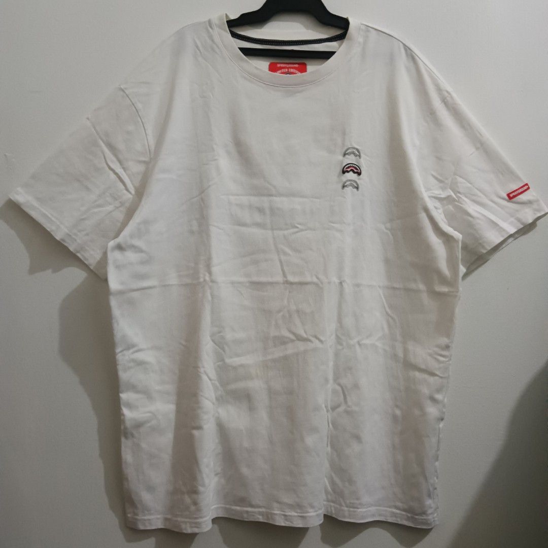 SPRAYGROUND Like New Condition Multi Logo Print (Category: Tshirts & Polo Shirts ) located in Caloocan City. Submitted by jaychingsss (Listing ID 1464135584, Image 2). Description: Sprayground Multi Logo Print - 180 22x29 No issue Complete Tags Like New Condition.