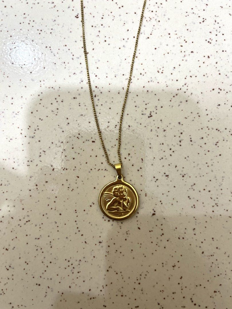 Stainless Medallion thinking angel necklace (Category: Necklaces) located in Rizal. Submitted by all_12 (Listing ID 1463987926, Image 1). Description: - 16 inches lace - Stainless steel non-fading - for everyday use not real gold -MOP: Gcash - Delivery via J&T.