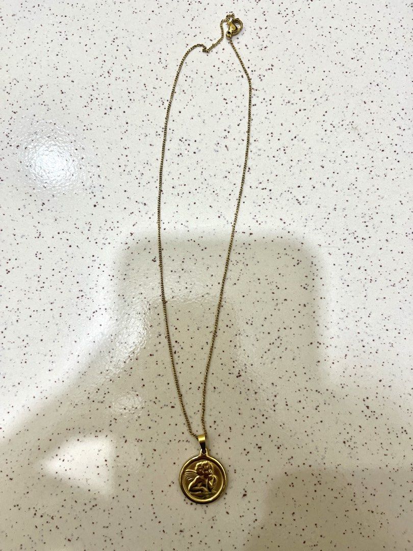 Stainless Medallion thinking angel necklace (Category: Necklaces) located in Rizal. Submitted by all_12 (Listing ID 1463987926, Image 3). Description: - 16 inches lace - Stainless steel non-fading - for everyday use not real gold -MOP: Gcash - Delivery via J&T.
