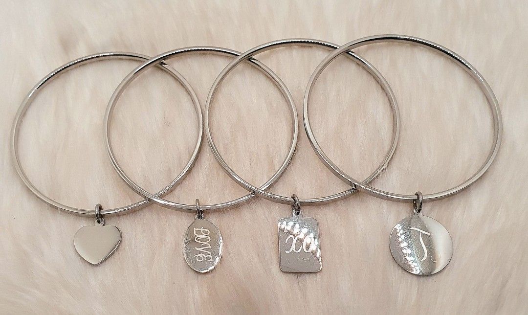 Stainless Steel Bangles with Charms (Category: Bracelets) located in San Juan City. Submitted by loulous_boutique_manila (Listing ID 1464047977, Image 1). Description: 🌸 Stainless steel bangles with charms 🌸 Diameter of Bangle: 2 ½ inches 🌸 SOLD INDIVIDUALLY 🌸 🌸 Non-tarnish 🌸 Not magnetic - Pls DM me for further inquiries - BUNDLE DISCOUNTS ARE AVAILABLE FOR PURCHASES OF 2 OR MORE ITEMS 🪙 PAYMENT IS THROUGH GCASH 🪙 - SHIPPING FEE TO BE SH