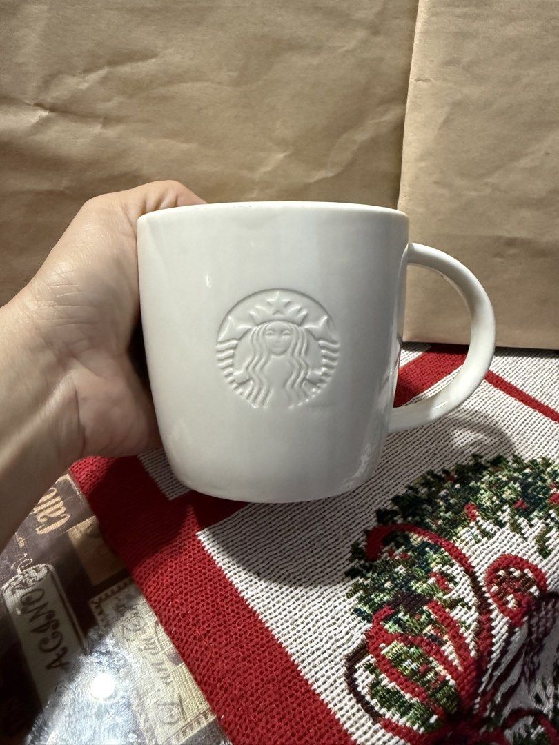 Starbucks White Mugs (Category: Coffee & Tea Tableware) located in Mandaue City. Submitted by erin_grace (Listing ID 1447457435, Image 3). Description: .