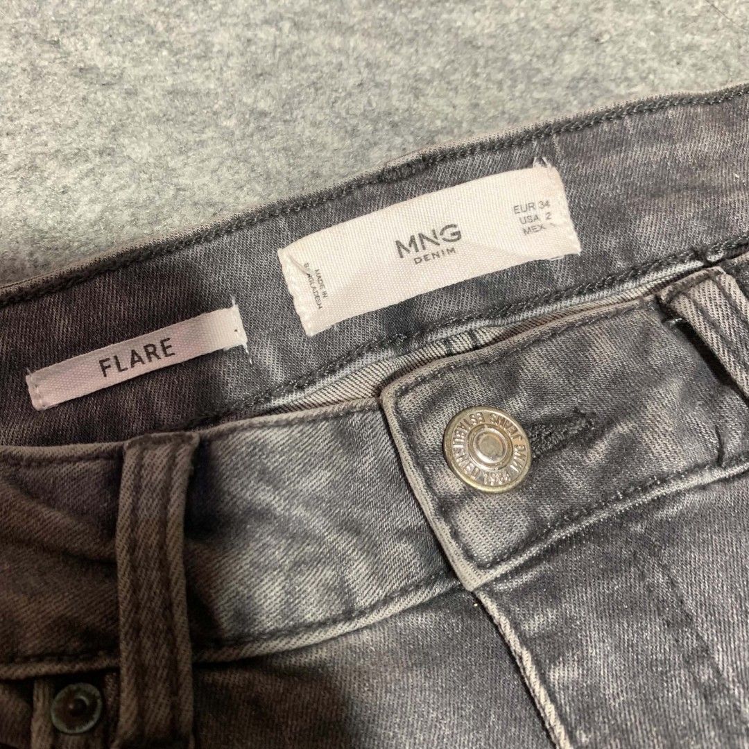 Stone Wash Flare Denim Jeans MNG (Category: Jeans) located in Bislig. Submitted by rndm_stff1 (Listing ID 1463988521, Image 3). Description: Dimensions Waist :24-30 elastic waistline Length :43 Rise :10 Thigh :9 Hem :10 Condition: Very good no issue, with stain (shown in picture).