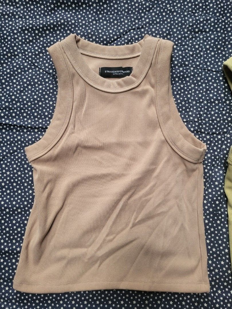 Straightforward tank top (Category: Activewear) located in Quezon City. Submitted by tikz_816 (Listing ID 1464019354, Image 2). Description: straightforward tank top razor back -womens 220 each 400 take all size : XS (w: 13in L:16in) color: mocha/olive condition: 9.5/10 buy with confidence over 150+ positvie feedback/reviews meet up: qc and nearby areas balintawak lrt1 station fishermall pantranco shipping available: to be shouldered by the buyer