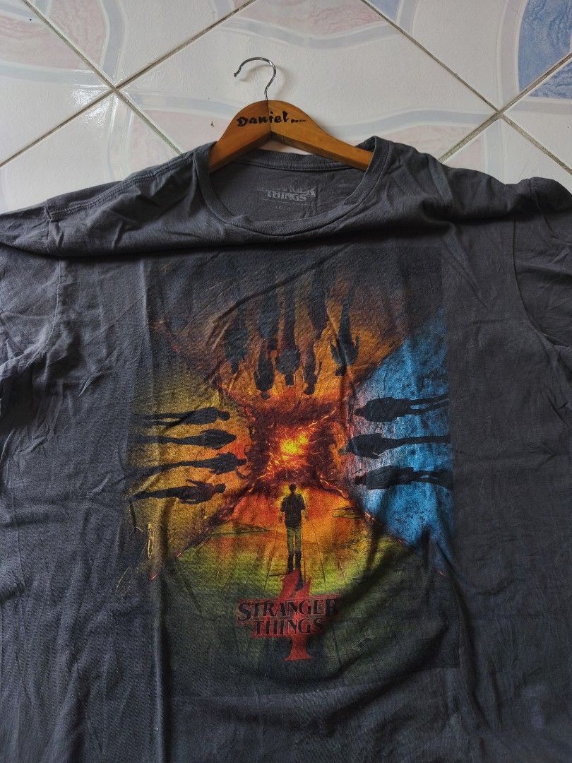 Stranger Things Shirt (Category: Tshirts & Polo Shirts ) located in Legazpi City. Submitted by cookandthriftzzzzz (Listing ID 1464069564, Image 1). Description: 22/27 dimes excellent no issue .