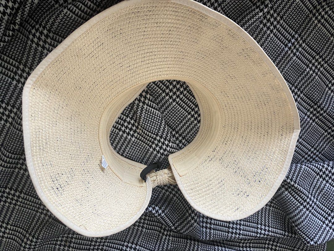 Straw hat sun visor (Category: Hats & Beanies) located in Angeles City. Submitted by jnwsurplus (Listing ID 1463977125, Image 2). Description: beige braided straw sun visor featuring a black leopard print pattern and an adjustable velcro closure.