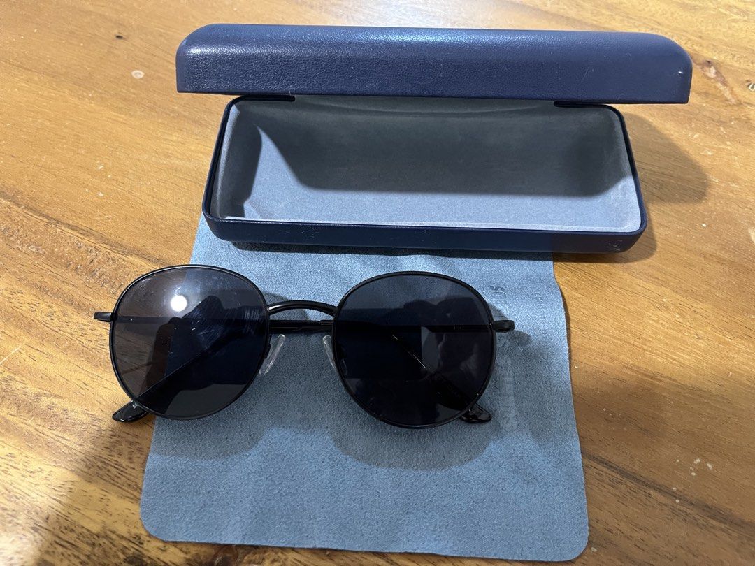 SUNNEYS STUDIOS Round Sunglasses with Case (Category: Sunglasses & Eyewear) located in Mandaluyong City. Submitted by unomarcelo001 (Listing ID 1464024718, Image 1). Description: - Brand: SUNNEYS STUDIOS - Style: Round Black Sunglasses - Model Number: 51-23-135-00 3N - Includes: Blue hard case and cleaning cloth - Ideal for: Everyday wear - Condition: Please check photos for details price still negotiable for sure buyers .