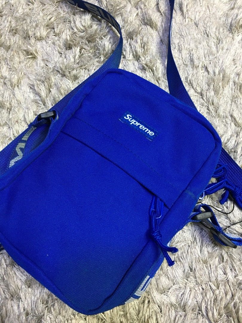 Supreme Shoulder Bag Royal Blue (Category: Sling Bags) located in Cabuyao City. Submitted by roronhilira (Listing ID 1463999583, Image 3). Description: Supreme SS18 Shoulder Bag in blue with original Supreme and Cordura tags attached. Classic design with front Supreme logo, zipped compartments and adjustable repeating Supreme logo strap. 800 plus ship very good condition DM📥.