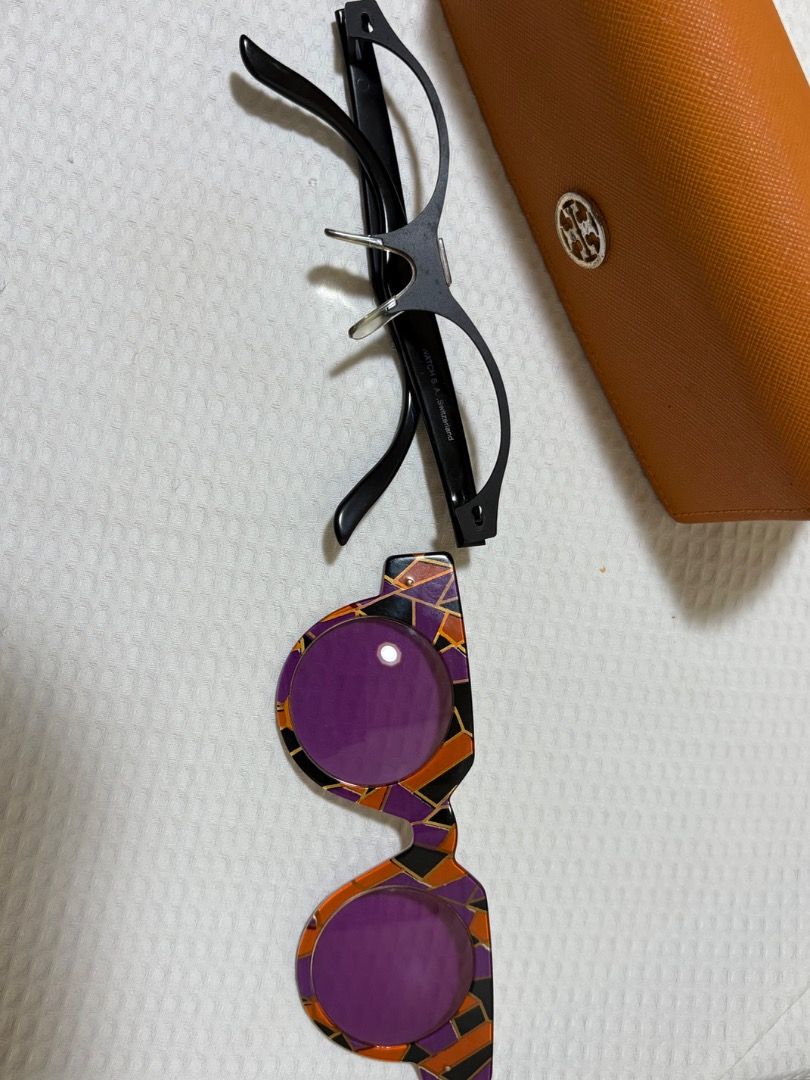 Swatch Sunglasses with Purple Lense (Category: Sunglasses & Eyewear) located in Caloocan City. Submitted by anne_938 (Listing ID 1463983964, Image 1). Description: - Swatch sunglasses with purple tinted lenses - Gold and black frame colorway - Made under license of Swatch B. A., Switzerland - Comes with an orange Tory Burch wallet - Ideal for sunny days.