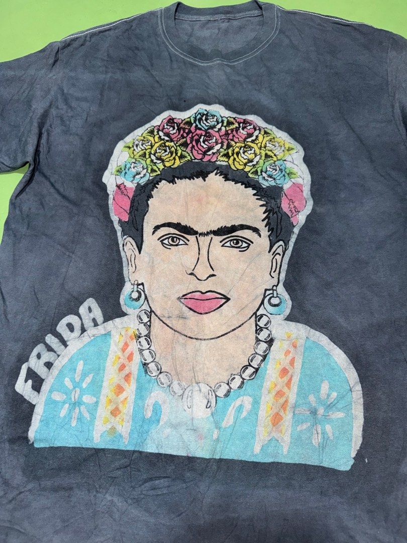 T Shirt (Category: Tshirts & Polo Shirts ) located in Pasig City. Submitted by reyeslarry11740 (Listing ID 1463976021, Image 3). Description: For Sale FRIDA KAHLO Portrait Art Shirt Men Size fit Large 21.5w x 29L Excellent to as new condition No issue Cut tag 1000 plus ship only Payment 1st Pasig city .