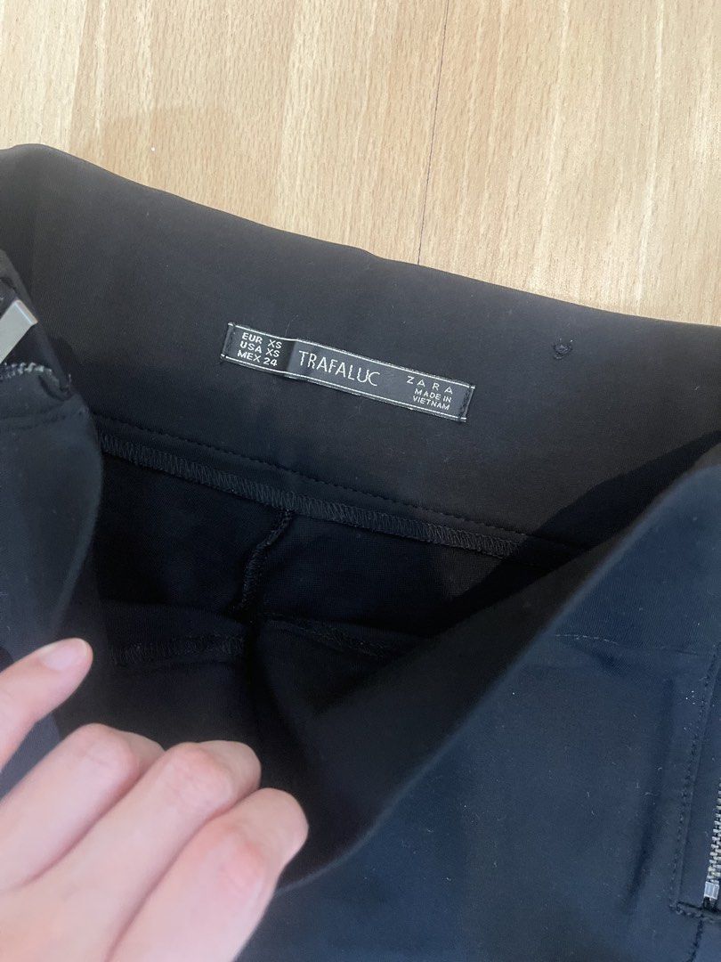 TAKE 5-Zara & Mango Trousers (size XS-S) (Category: Jeans) located in Quezon City. Submitted by brightwolf_7ef5d3 (Listing ID 1464015193, Image 3). Description: - Bundle includes pants from MNG Basics and Trafaluc. - Colors: Black, Navy, and Grey. - Some pants feature stylish zip details. - Versatile for both work and casual outfits. - All items are in good, pre-loved condition..