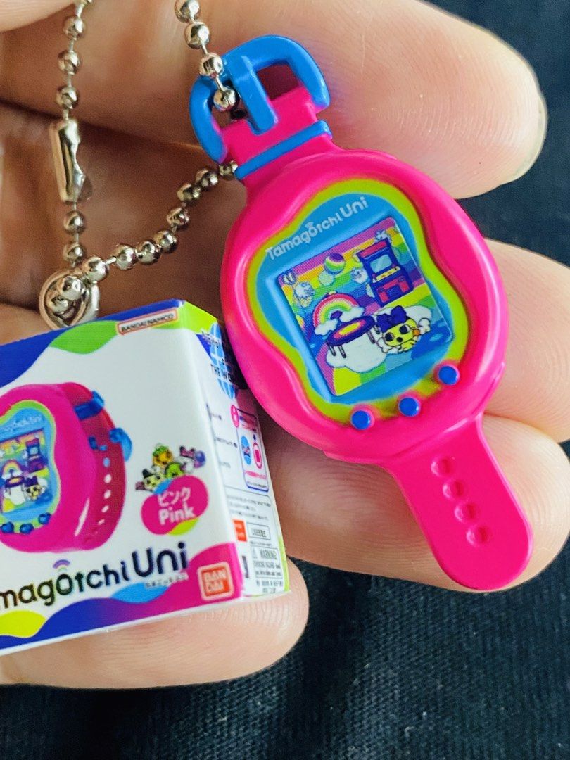 Tamagotchi Uni Miniature Charm Pink Keychain (Category: Other Merchandise) located in Manila. Submitted by kawaii_omocha_est2020 (Listing ID 1464087286, Image 3). Description: ✅ Mine Now, Pay Now ✅ Please check all photos for complete details. ✅ Please manage your expectations, most items are preloved and not for those who are sensitive about condition. ✅ Actual color may vary due to lighting conditions. ✅ Due to limited reply quota, I will only 