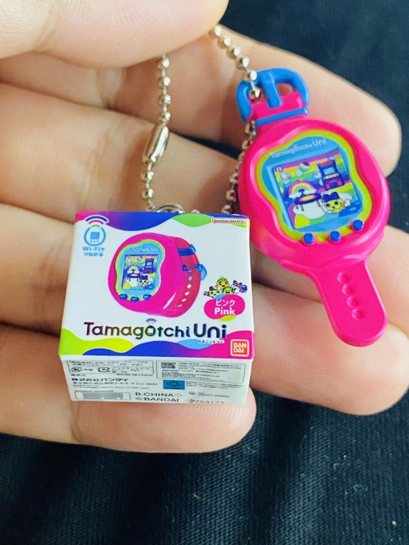 Tamagotchi Uni Miniature Charm Pink Keychain (Category: Other Merchandise) located in Manila. Submitted by kawaii_omocha_est2020 (Listing ID 1464087286, Image 1). Description: ✅ Mine Now, Pay Now ✅ Please check all photos for complete details. ✅ Please manage your expectations, most items are preloved and not for those who are sensitive about condition. ✅ Actual color may vary due to lighting conditions. ✅ Due to limited reply quota, I will only 