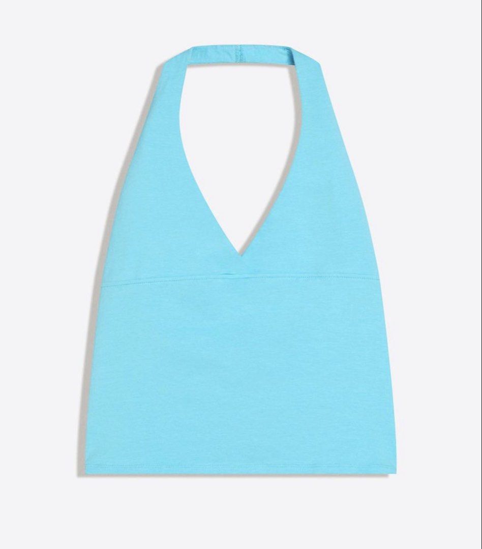 Teal Halter Top (Category: Sleeveless) located in Manila. Submitted by chicdistrict.ph (Listing ID 1463976771, Image 2). Description: - Cute blue halter neck crop top - Flattering V-neck design - Stretchy material for comfort - Versatile for summer days or nights out - Pairs perfectly with high-waisted bottoms.