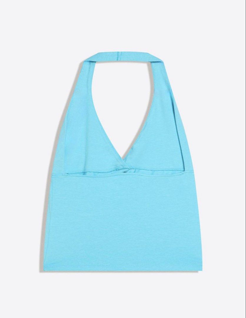 Teal Halter Top (Category: Sleeveless) located in Manila. Submitted by chicdistrict.ph (Listing ID 1463976771, Image 3). Description: - Cute blue halter neck crop top - Flattering V-neck design - Stretchy material for comfort - Versatile for summer days or nights out - Pairs perfectly with high-waisted bottoms.