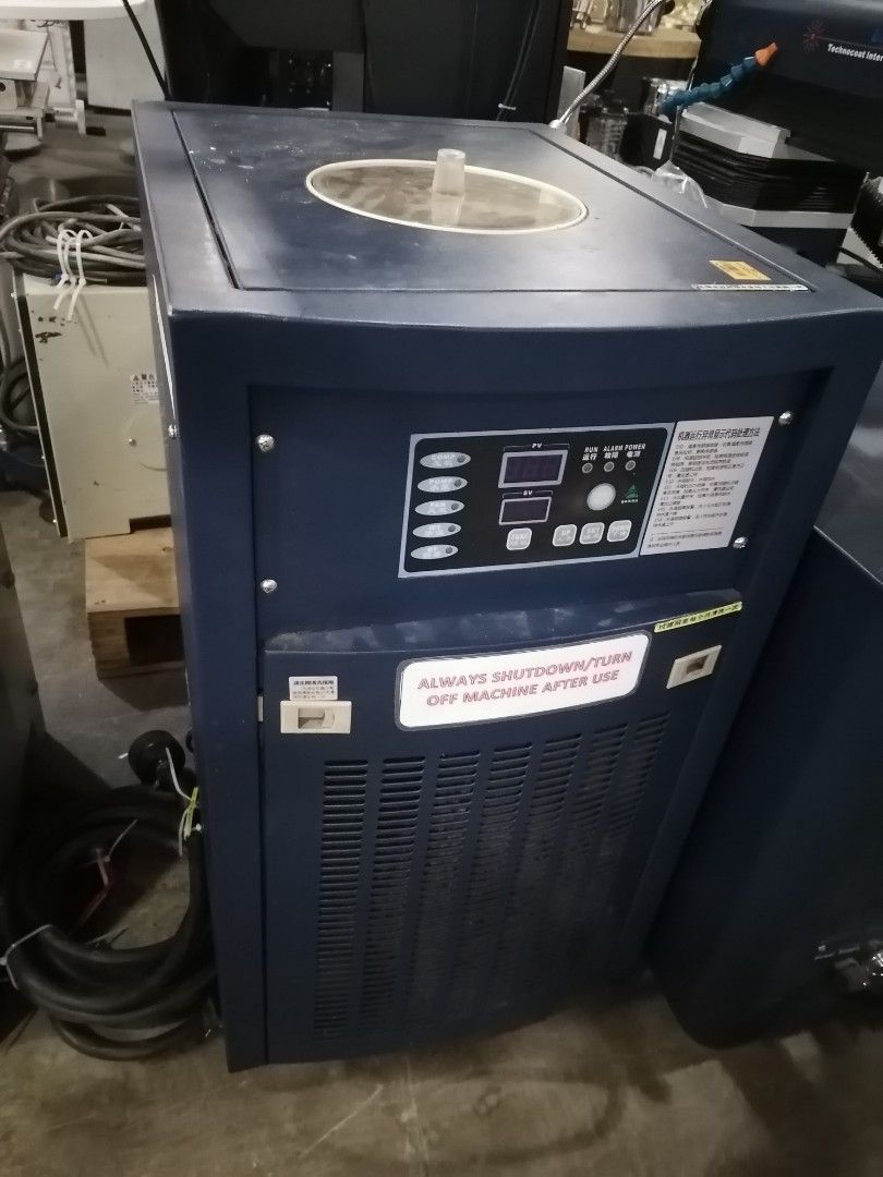 Techno-Laser Machine with Chiller and Table (Category: Industrial Equipment) located in Muntinlupa City. Submitted by fast_bryantorrentefernand (Listing ID 1463986191, Image 3). Description: - Techno-Laser Machine - Includes Chiller Unit - Adjustable Table - Color: Dark Blue and Grey - Note: Some scuff marks on table surface - Power Cables Included - Ideal for Industrial Applications - Sold as a Set.