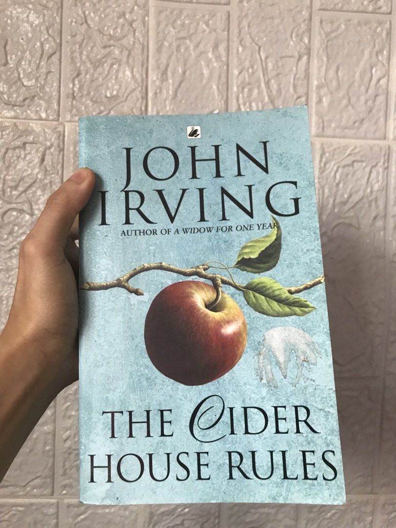 The Cider House Rules by John Irving Paperback Book (Category: Storybooks) located in Pilar. Submitted by dhelsomera20308 (Listing ID 1463989829, Image 1). Description: - John Irving's The Cider House Rules - Paperback edition - Set in rural Maine - Follows Homer Wells' journey - Explores themes of family and life choices - Great for literary fiction fans.