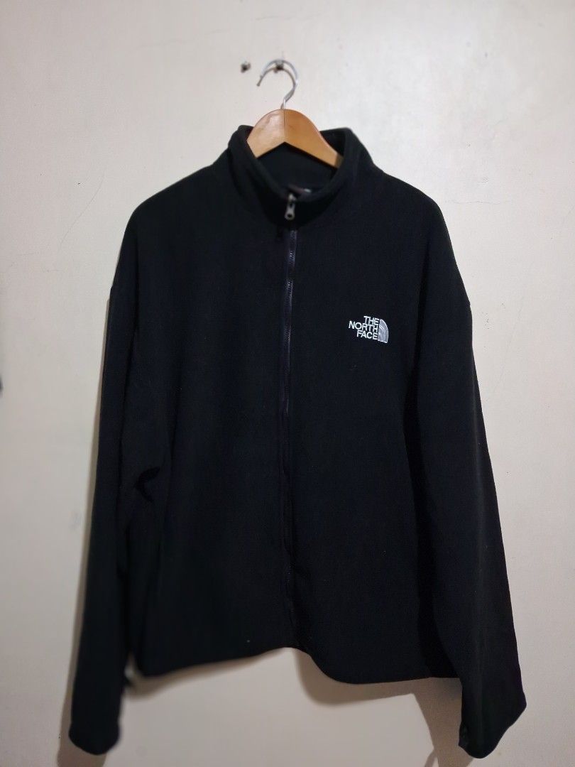 The North Face Black Fleece Full Zip Jacket (Category: Coats, Jackets and Outerwear) located in Manila. Submitted by randf_selections (Listing ID 1464124496, Image 1). Description: Black fleece jacket from The North Face. Full zip closure. Has the embroidered logo on the chest. Great for layering or wearing on its own. Comfortable and warm material. Good for outdoor activities or casual wear..