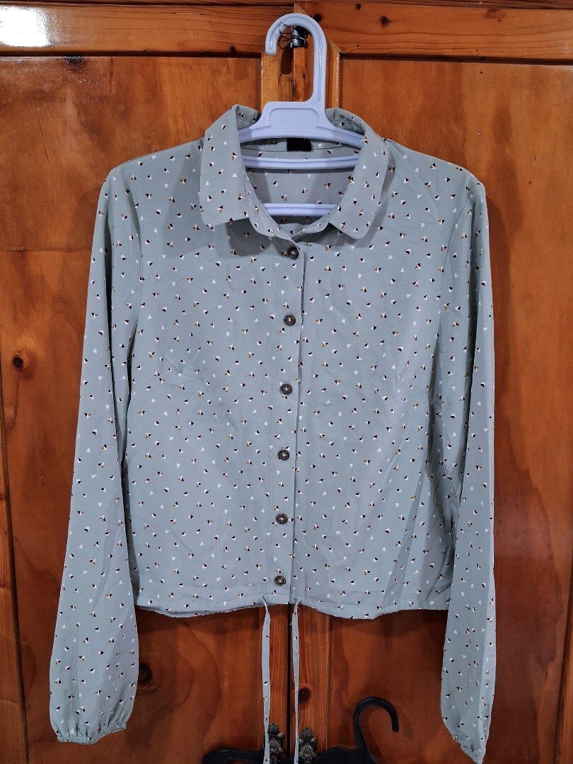 This & More Pastel Green Print Button Down Blouse (Category: Blouses) located in Bauang. Submitted by tavias.shop (Listing ID 1460160456, Image 1). Description: from US box semi cropped with drawstring at the waist small on tag fit up to medium petite like forever 21 quality.
