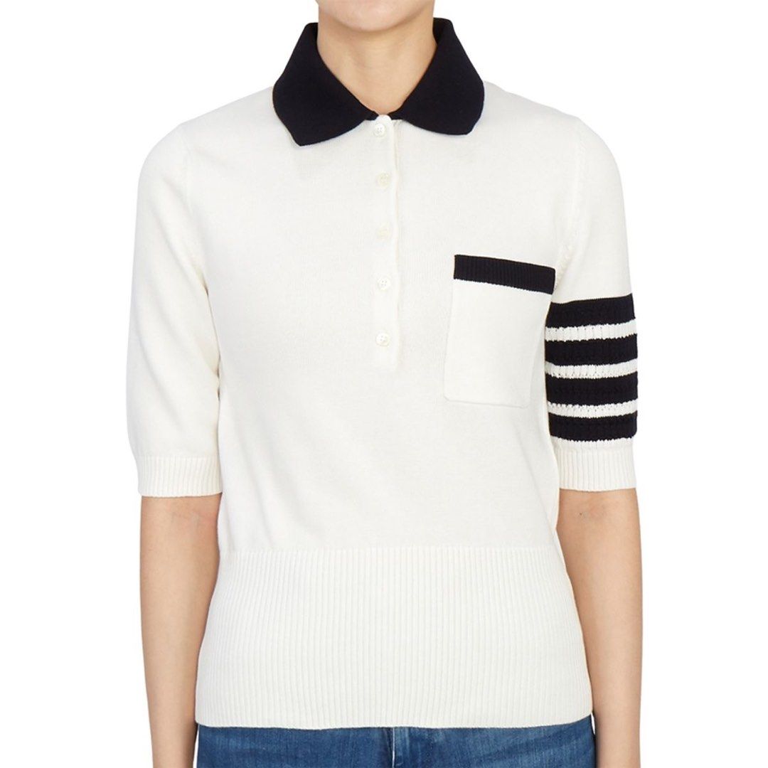 Thom Browne Hector Intarsia Polo sweater (Category: Others Tops) located in Quezon City. Submitted by shanks. (Listing ID 1464007377, Image 2). Description: Thom Browne Hector Intarsia Polo sweater featuring a black dachshund graphic on the back and signature diagonal striped details on the sleeve. Size : 40 Dimensions : Length: 23 inches Width: 18 inches Shoulder: 16 inches Sleeve : 12 inches Sign of wear in good condition .