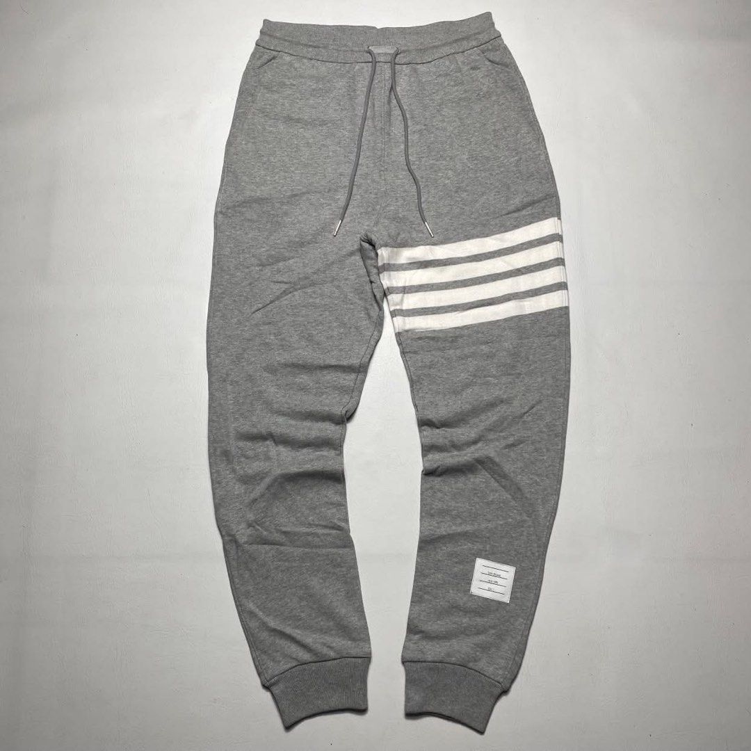 THOM BROWNE SWEATPANTS (Category: Joggers) located in San Fernando. Submitted by upwear.ph (Listing ID 1464062393, Image 1). Description: THOM BROWNE SWEATPANTS CONDITION : EXCELLENT SIZE : SMALL DIMENSIONS: W30-35 x L42 ISSUE: NONE .