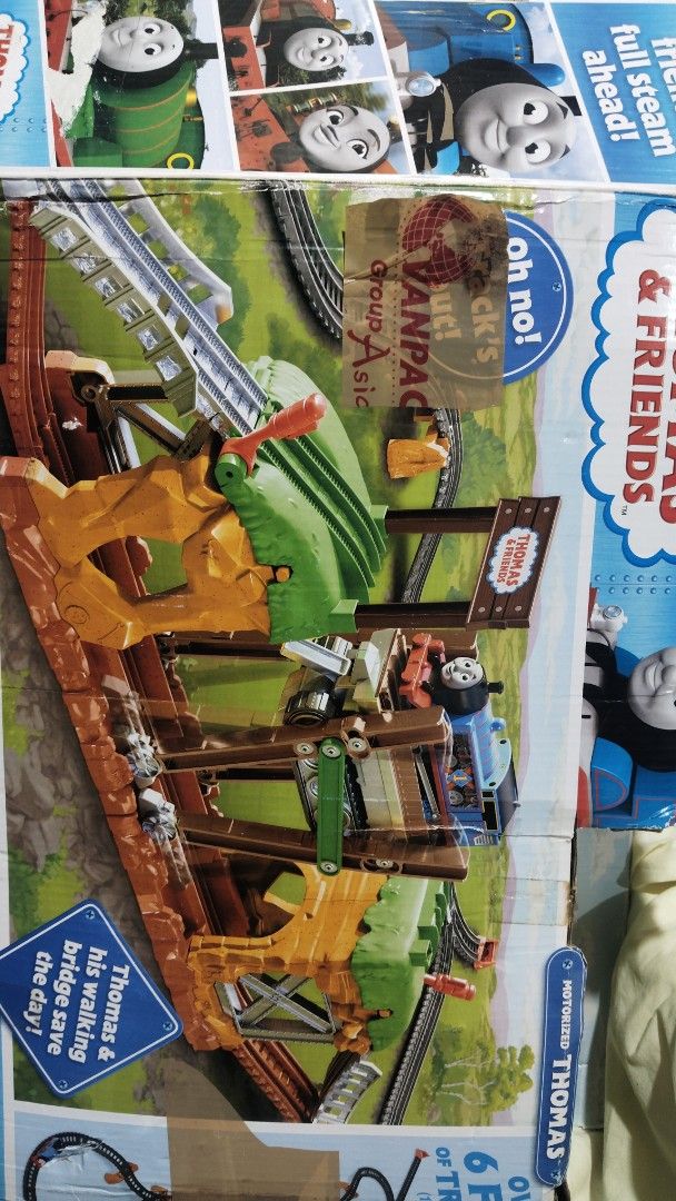 Thomas & Friends Motorized Thomas Walking Bridge Playset (Category: Kids Toys) located in Baguio. Submitted by maryhazel.22 (Listing ID 1463947676, Image 1). Description: - Motorized Thomas train for exciting play - Features a unique walking bridge - Comes with tracks and accessories for imaginative scenarios - Box slogan: 'Thomas & his walking bridge save the day!' - Ideal for fans of the Thomas & Friends show -complete set the only issue is the