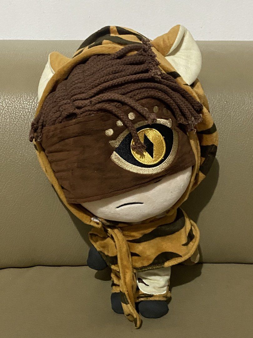 Tiger Costume Plush Toy (Category: Plushies & Soft Toys) located in Davao. Submitted by hoowans_surplus (Listing ID 1463953671, Image 1). Description: - Adorable plush toy - Comes with a removable tiger costume - Costume includes a hood with ears and a tie - Plush has button eyes and a simple mouth - Ideal for collectors or as a gift.