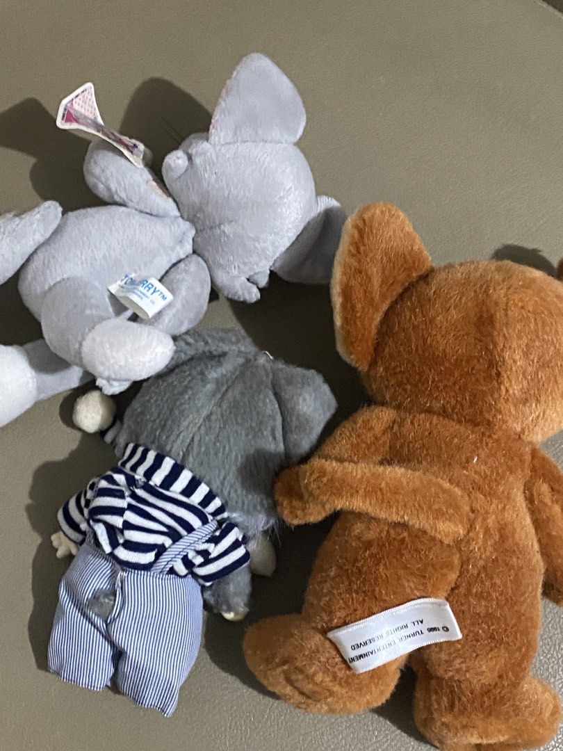 Tom and Jerry Plush Toys Bundle (Category: Plushies & Soft Toys) located in Davao. Submitted by hoowans_surplus (Listing ID 1464067700, Image 2). Description: - Bundle includes 3 Tom and Jerry plush toys. - Features a grey Tom plush wearing a blue striped outfit and overalls. - Includes a brown Jerry plush. - Comes with an additional grey plush toy. - Ideal for fans of the classic Tom and Jerry cartoon. - Great as cute collectibles..