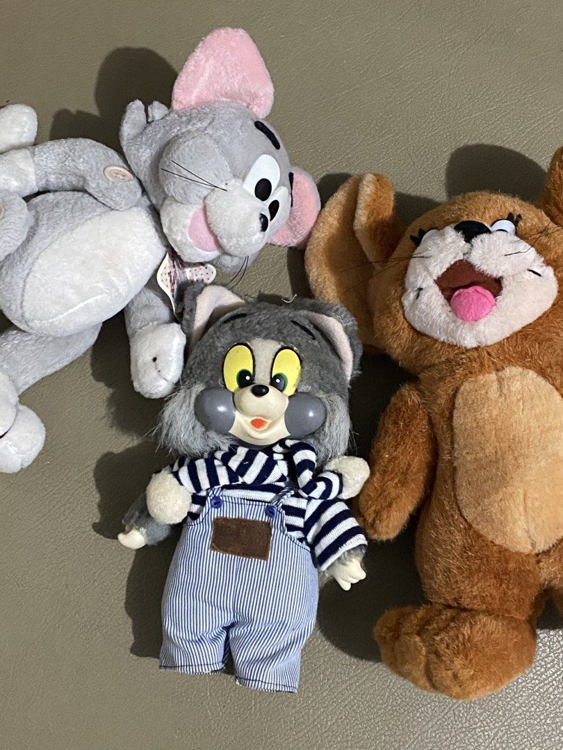 Tom and Jerry Plush Toys Bundle (Category: Plushies & Soft Toys) located in Davao. Submitted by hoowans_surplus (Listing ID 1464067700, Image 1). Description: - Bundle includes 3 Tom and Jerry plush toys. - Features a grey Tom plush wearing a blue striped outfit and overalls. - Includes a brown Jerry plush. - Comes with an additional grey plush toy. - Ideal for fans of the classic Tom and Jerry cartoon. - Great as cute collectibles..