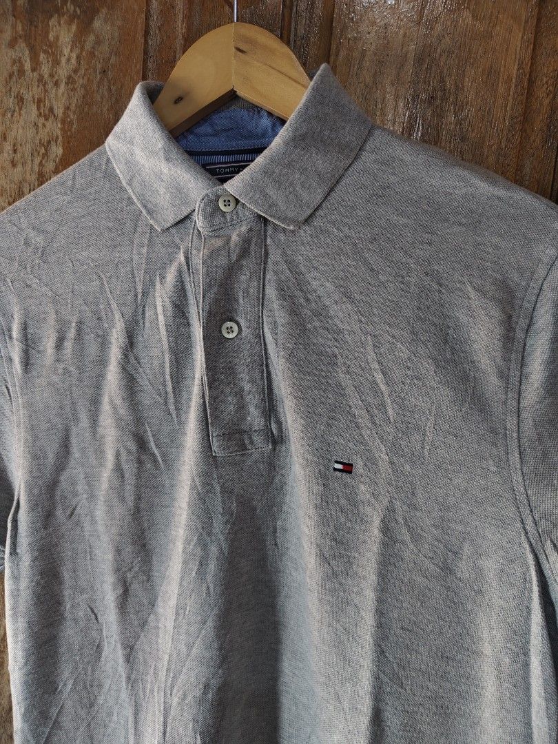 Tommy Hilfiger Polo Shirt Gray (Category: Tshirts & Polo Shirts ) located in Iloilo. Submitted by branded-boy0422_16 (Listing ID 1463941163, Image 2). Description: Small On Tag fit to Meduim to Large W: 19-20 L: 28/29 Good as new No issue.