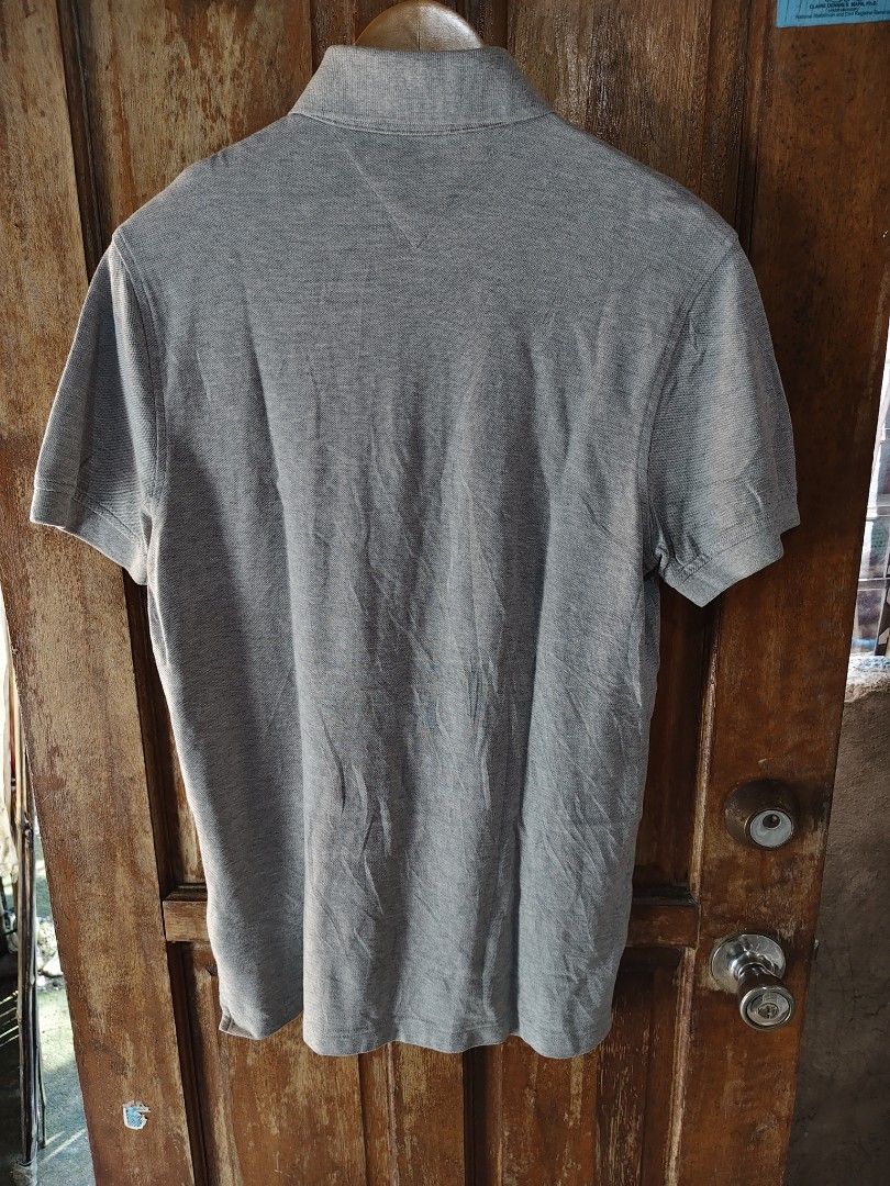 Tommy Hilfiger Polo Shirt Gray (Category: Tshirts & Polo Shirts ) located in Iloilo. Submitted by branded-boy0422_16 (Listing ID 1463941163, Image 3). Description: Small On Tag fit to Meduim to Large W: 19-20 L: 28/29 Good as new No issue.