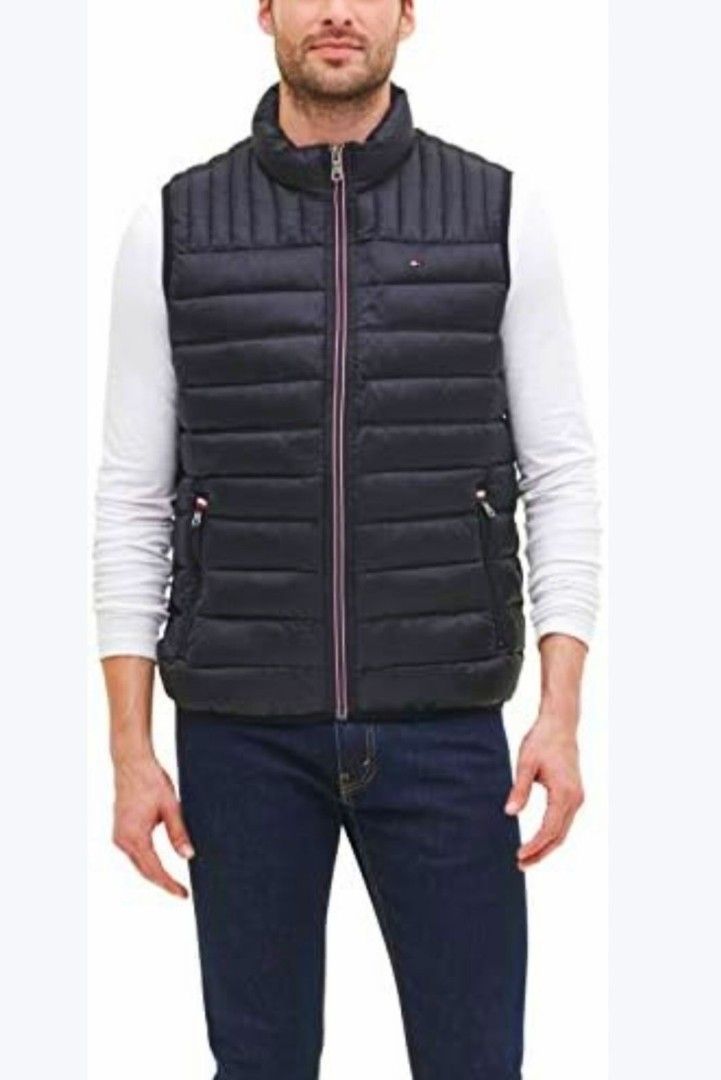 Tommy Hilfiger Ultra light down Puffer Vest (Category: Coats, Jackets and Outerwear) located in Caloocan City. Submitted by modishthriftstore (Listing ID 1464041795, Image 1). Description: Good as New XL size for men No Issues loc: Rainbow village 5 north Caloocan.