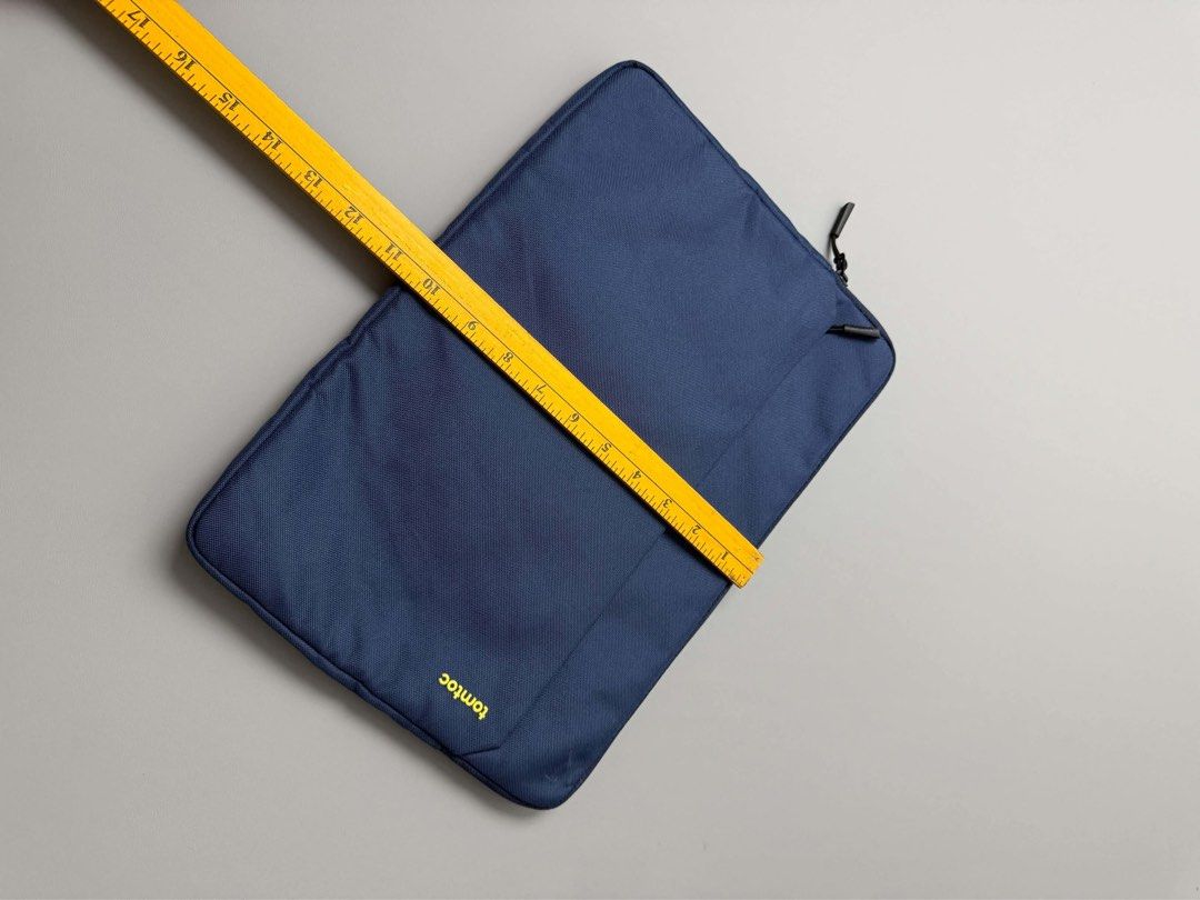 TOMTOC (Category: Laptop Bags & Sleeves) located in Guagua. Submitted by sweetboyy (Listing ID 1464063299, Image 3). Description: TOMTOC LIGHT B18 TABLET SLEEVE 11” NAVY BLUE.