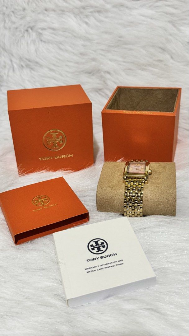 Tory Burch Gold Tone Watch with Pink Face (Category: Women's Watches) located in Caloocan City. Submitted by anicaaaaaa (Listing ID 1463940825, Image 1). Description: TORY BURCH ELEANOR WATCH Mother of Pearl Pink Dial • Gold-Tone Stainless Steel ♡ Brand New ♡ Authentic / Original ♡ Comes with Tory Burch box ♡ Includes watch booklet ♡ No receipt ♡ No paper bag ♡ What you see is what you get Selling for ₱15,000 📍 Meet-up: SM Manila 🛵 Lalamove rea