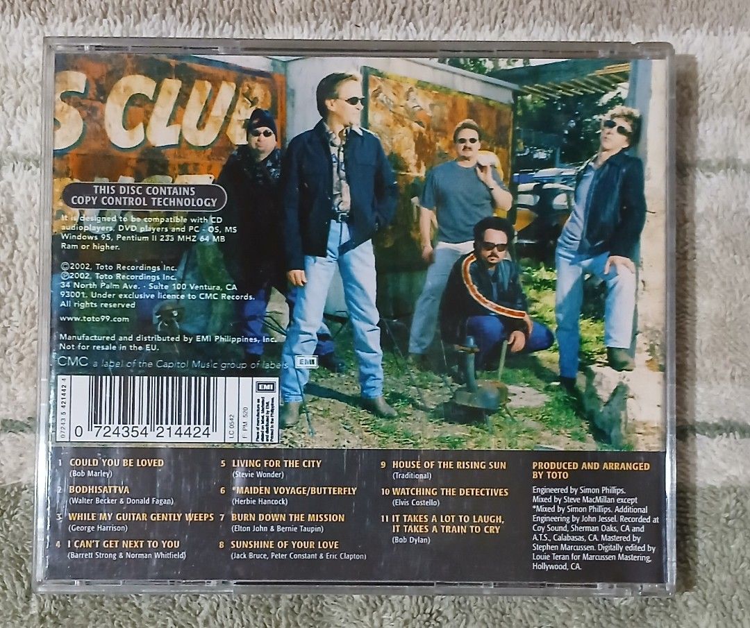 Toto: Through the Looking Glass CD (Category: CDs & DVDs) located in Manila. Submitted by miczngrz (Listing ID 1463951720, Image 2). Description: * Artist: Toto * Album: Through the Looking Glass * Price: 550 (buy 2 or more CDs from my listings to get a discount) * Release date: 2002 * Features cover songs from various artists * Includes Copy Control technology * A must-have for any Toto fan's collection * Tracklist: Could You Be Loved Bodhisattv