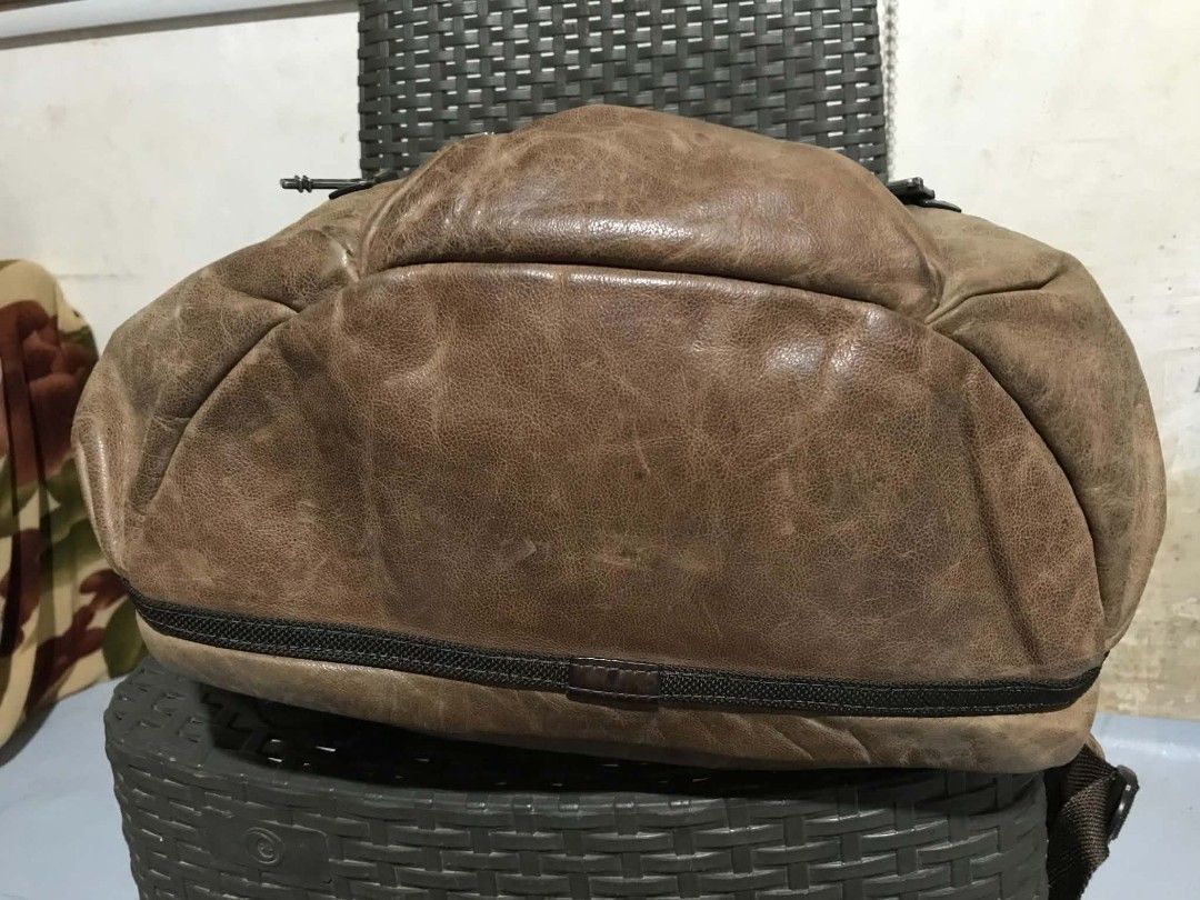 TUMI GENUINE LEATHER BAGPACK BROWN (Category: Backpacks) located in Aloran. Submitted by thrift_hunter73 (Listing ID 1464050492, Image 3). Description: TUMI GENUINE LEATHER BAGPACK BROWN.